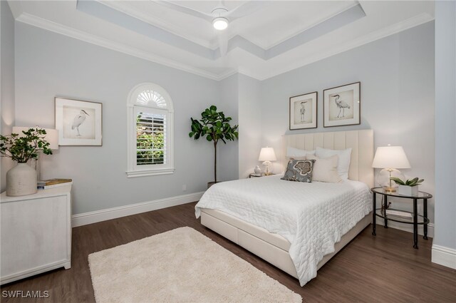 455 1st Ave N, Naples, FL 34102 - bedroom featuring a tray ceiling, dark wood-style floors, crown molding, and baseboards