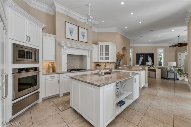 455 1st Ave N, Naples, FL 34102 - kitchen featuring appliances with stainless steel finishes, ceiling fan, a warming drawer, a sink, and recessed lighting