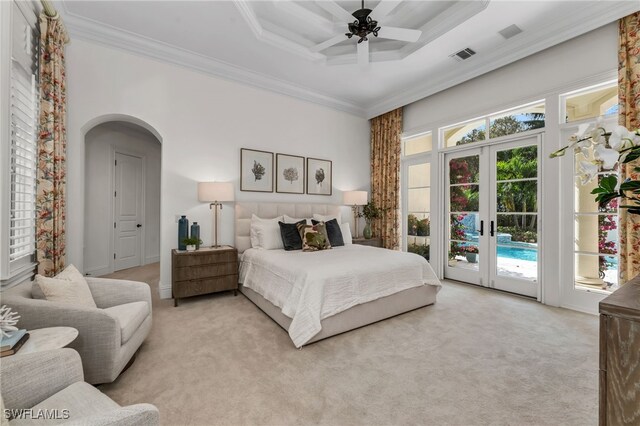 455 1st Ave N, Naples, FL 34102 - bedroom with access to outside, light carpet, multiple windows, ornamental molding, and a towering ceiling