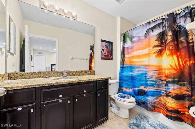 full bath with vanity, toilet, and tile patterned floors