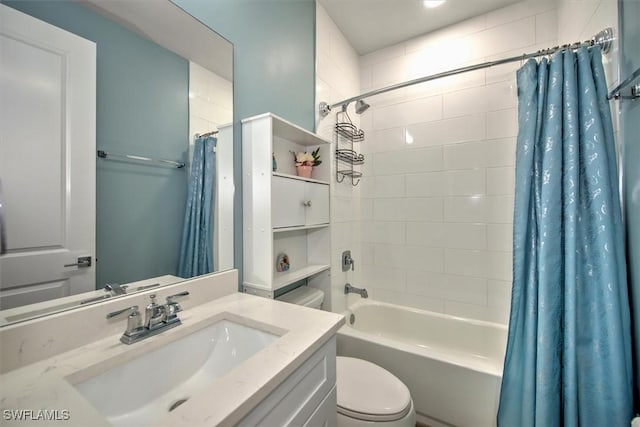 full bathroom with toilet, vanity, and shower / bath combo with shower curtain