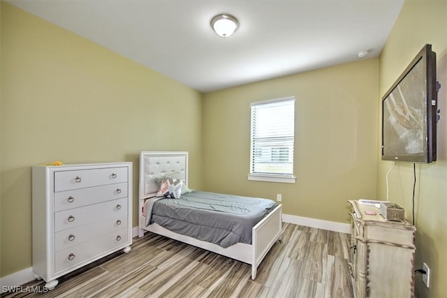 bedroom featuring light wood-type flooring