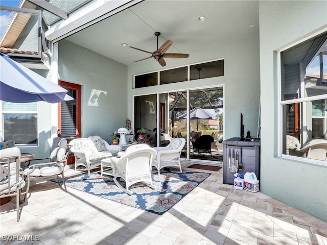 view of patio with ceiling fan