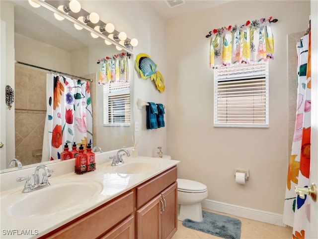 bathroom featuring vanity, curtained shower, tile patterned floors, and toilet