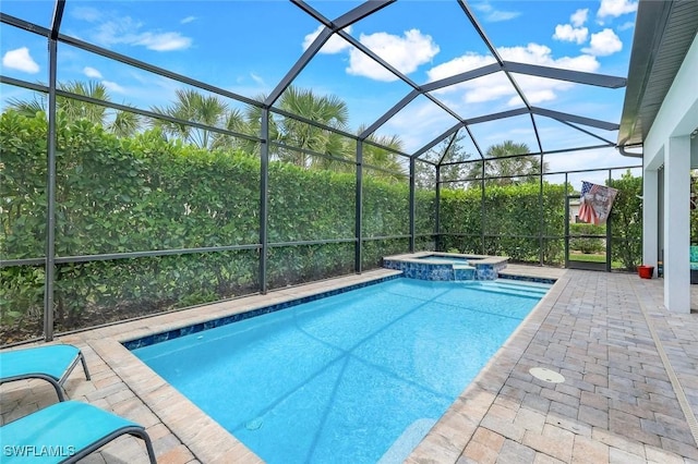 9368 Night Heron Ln, Naples, FL 34120 - view of swimming pool with a pool with connected hot tub, a patio, and glass enclosure