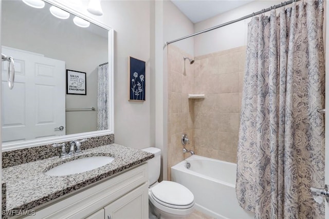 9368 Night Heron Ln, Naples, FL 34120 - full bathroom featuring toilet, shower / bath combination with curtain, and vanity