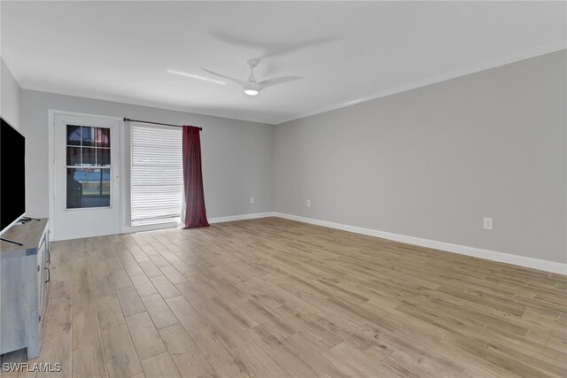 unfurnished room featuring ceiling fan, ornamental molding, and light wood-type flooring