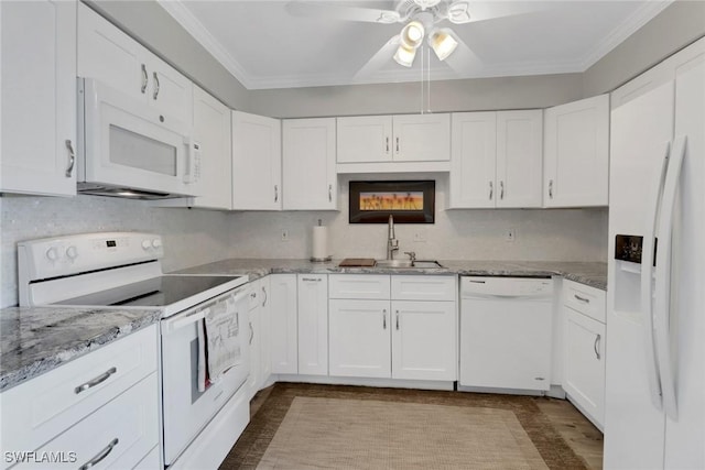 kitchen with ceiling fan, a sink, white appliances, white cabinetry, and ornamental molding