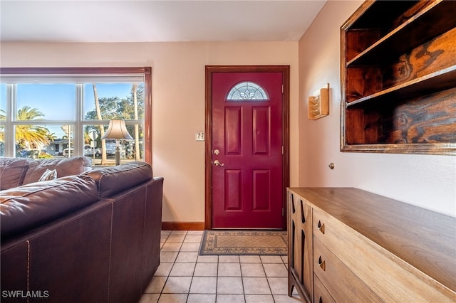 foyer featuring light tile patterned floors