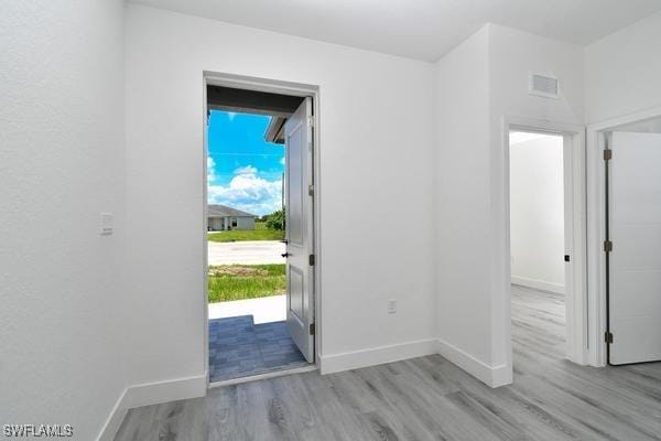 entrance foyer featuring light hardwood / wood-style floors