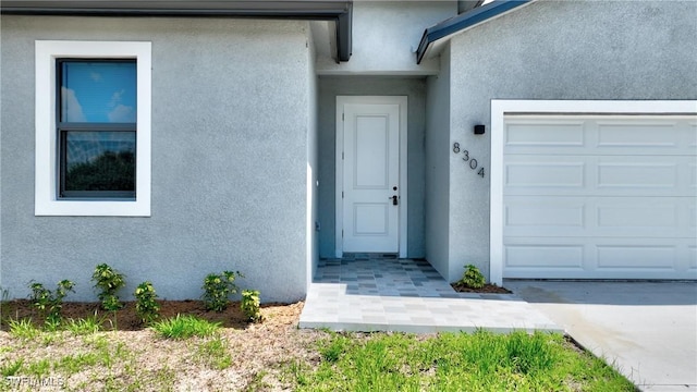 entrance to property with a garage