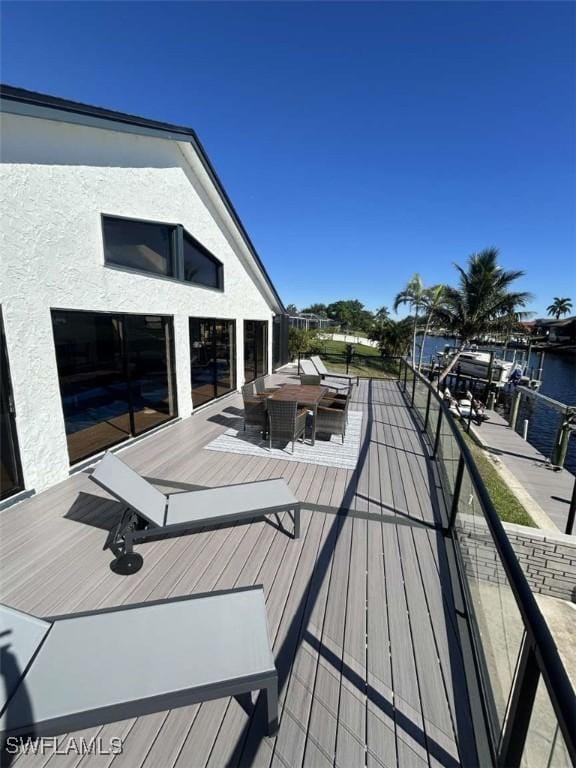 deck featuring a water view