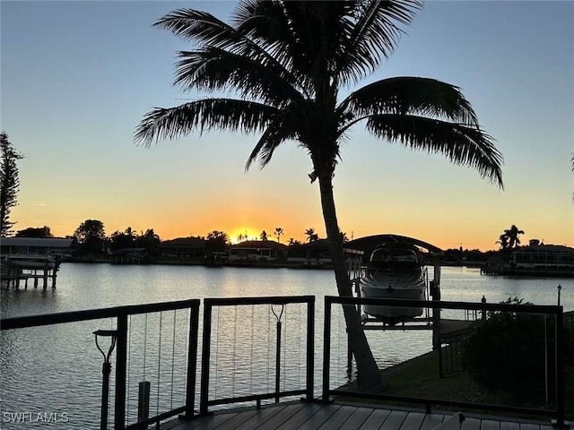 view of dock with a water view