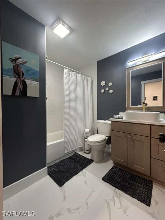 full bathroom with vanity, toilet, and shower / bath combo with shower curtain