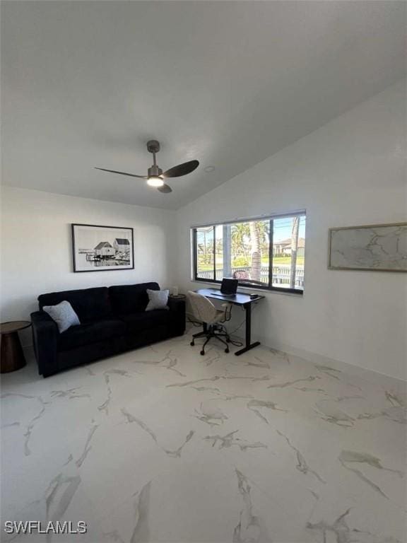 living room with ceiling fan and lofted ceiling