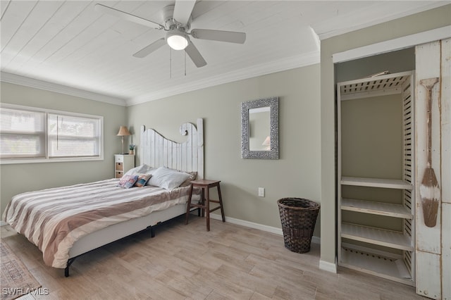 bedroom featuring crown molding, ceiling fan, and light hardwood / wood-style floors