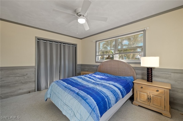 bedroom featuring crown molding and ceiling fan