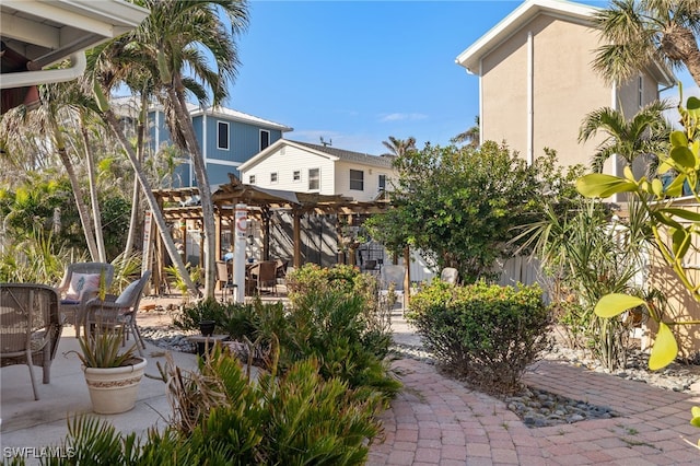 exterior space featuring a pergola