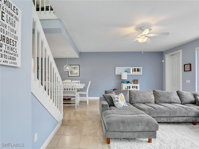 living room with ceiling fan