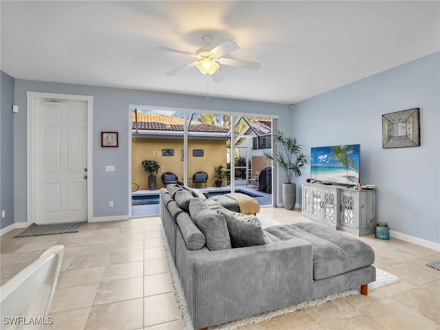 tiled living room featuring ceiling fan