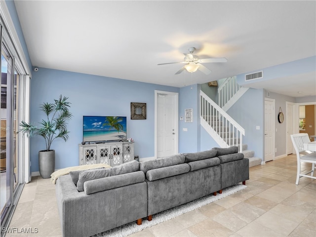 living room featuring ceiling fan