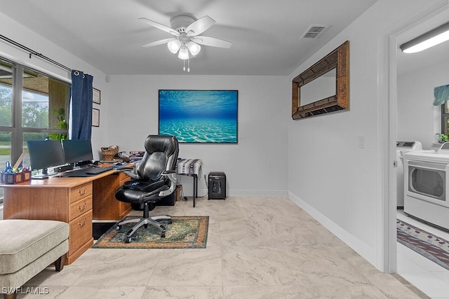 office area featuring washer / clothes dryer and ceiling fan