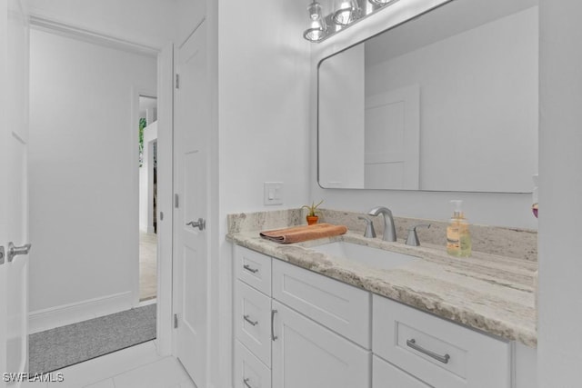 bathroom featuring vanity and tile patterned flooring