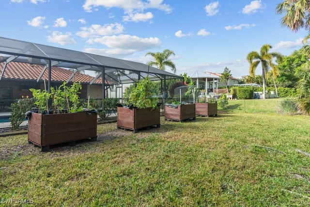 view of yard featuring glass enclosure