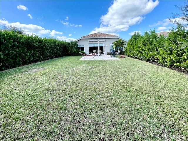 4176 Madison St, Ave Maria, FL 34142 - view of grassy yard with a patio