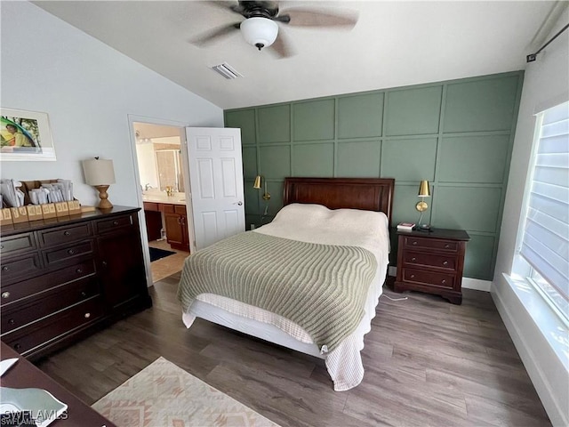 4176 Madison St, Ave Maria, FL 34142 - bedroom featuring lofted ceiling, wood finished floors, baseboards, a ceiling fan, and ensuite bathroom