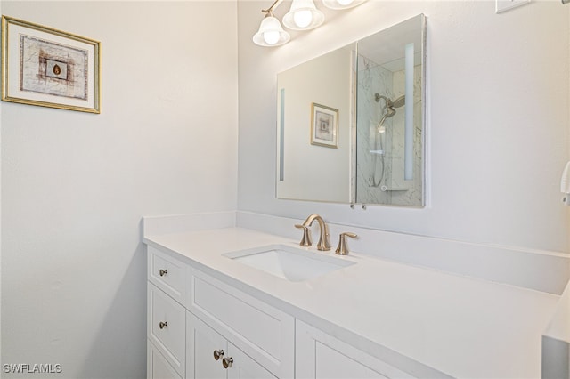 bathroom with vanity and walk in shower