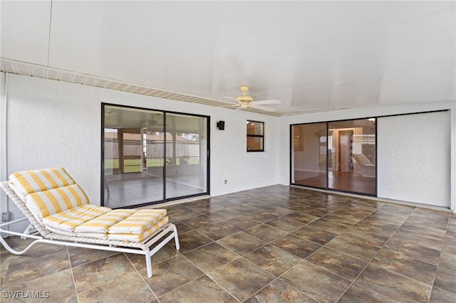 view of patio / terrace featuring ceiling fan