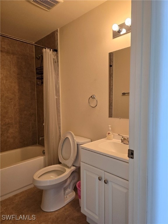 full bathroom featuring tile patterned floors, toilet, vanity, and shower / tub combo