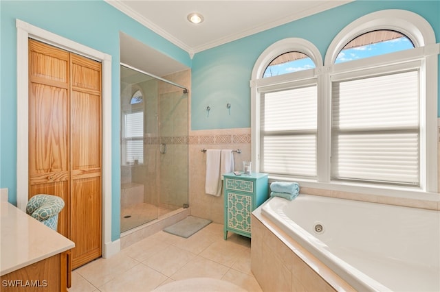 bathroom featuring tile walls, vanity, separate shower and tub, crown molding, and tile patterned floors