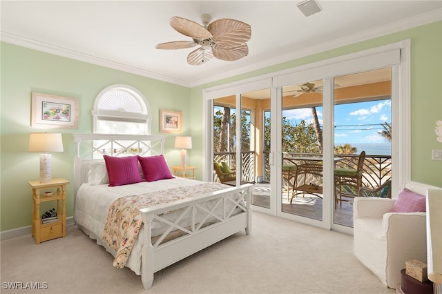 carpeted bedroom featuring access to exterior, crown molding, and ceiling fan