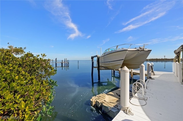 view of dock with a water view