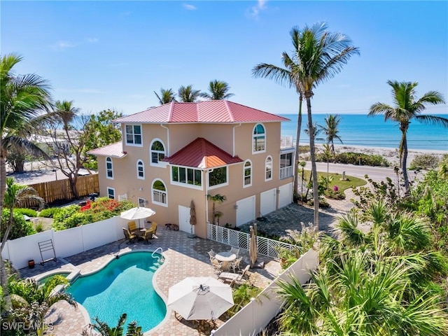 15899 Captiva Dr, Captiva, FL 33924 - back of property featuring a fenced in pool, a water view, and a patio area