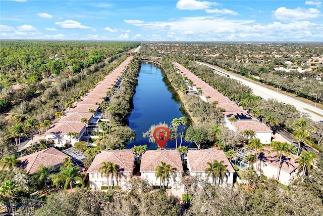 aerial view featuring a water view and a residential view