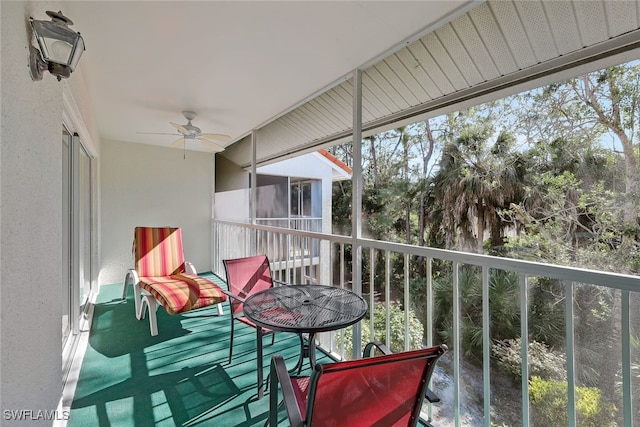 balcony featuring ceiling fan