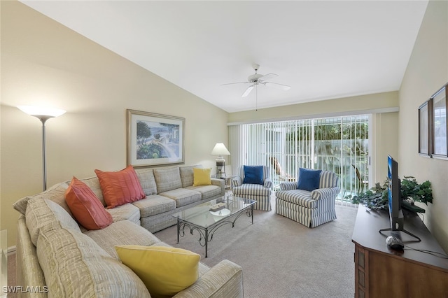 living room featuring lofted ceiling, light colored carpet, and ceiling fan