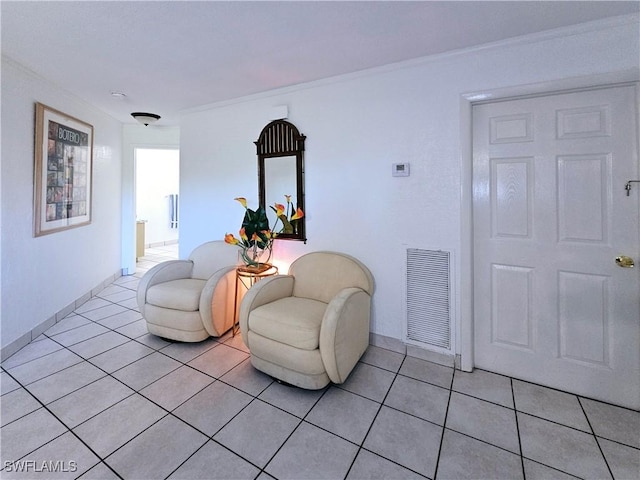 sitting room featuring light tile patterned floors