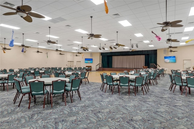 dining room with a paneled ceiling