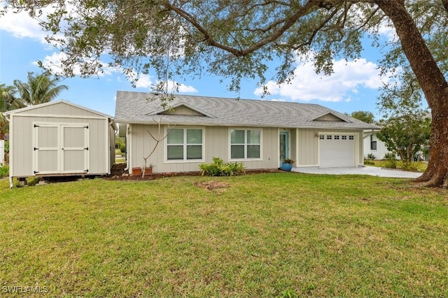 ranch-style home featuring a storage shed, a garage, and a front lawn