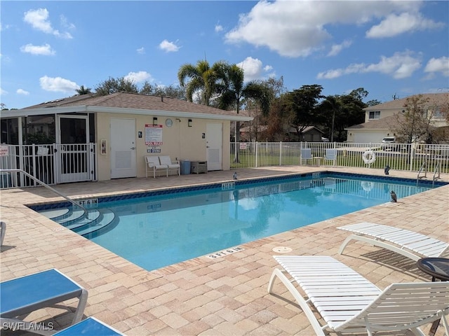 view of pool featuring a patio