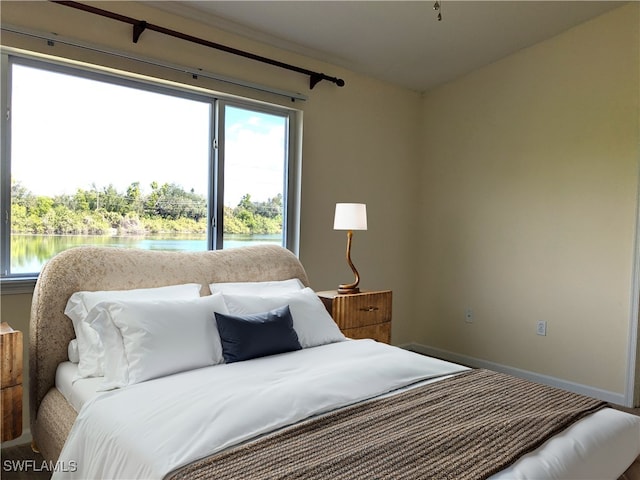 bedroom with a water view