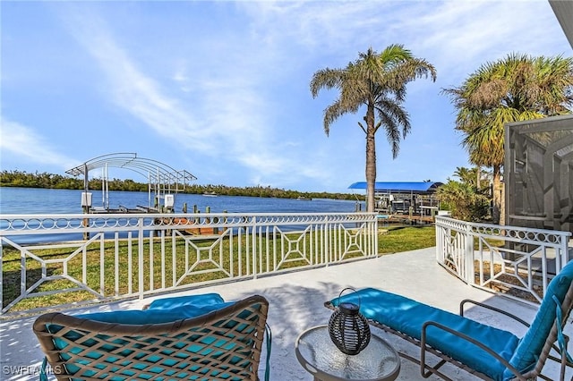 view of patio featuring a water view