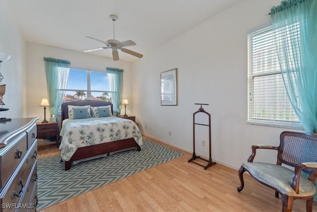 bedroom featuring ceiling fan and light wood-type flooring