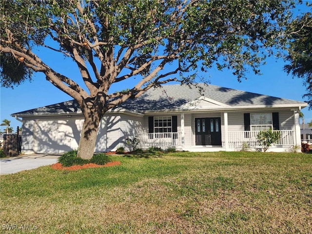 single story home featuring a front yard and covered porch