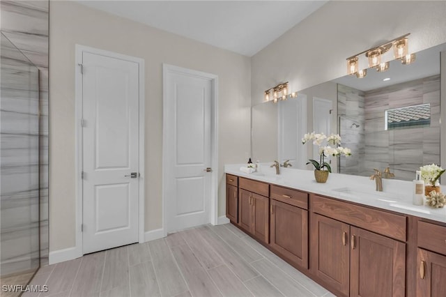 bathroom with vanity and walk in shower