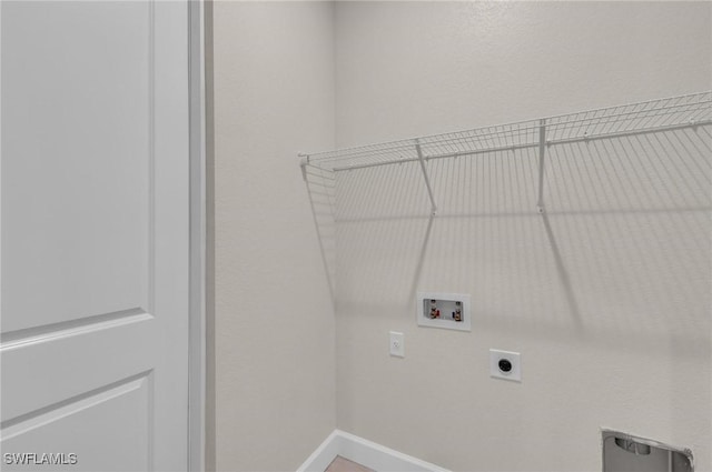 laundry area with washer hookup and hookup for an electric dryer